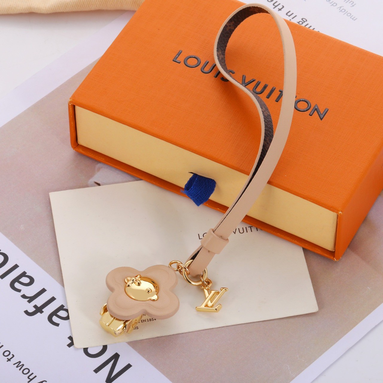 PP10443 พวงกุญแจ L(ครีม)